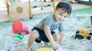 A Pre-Nursery student discovering his surroundings at the Discovery Space.