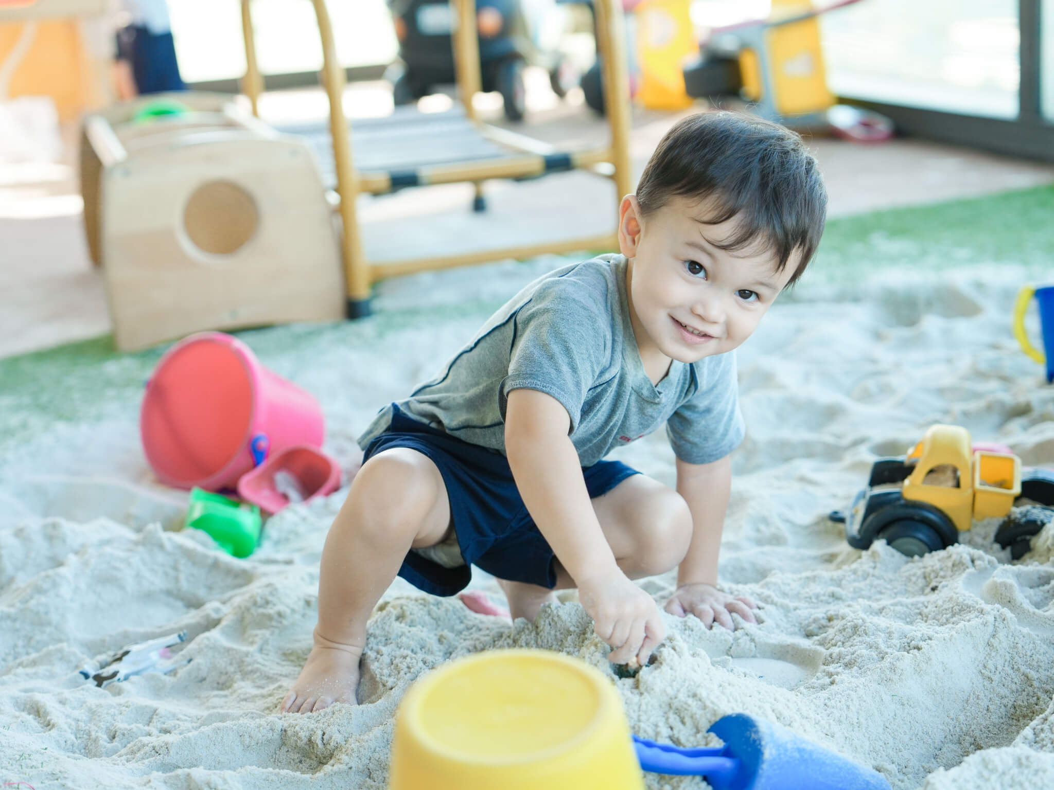 A Pre-Nursery student discovering his surroundings at the Discovery Space.